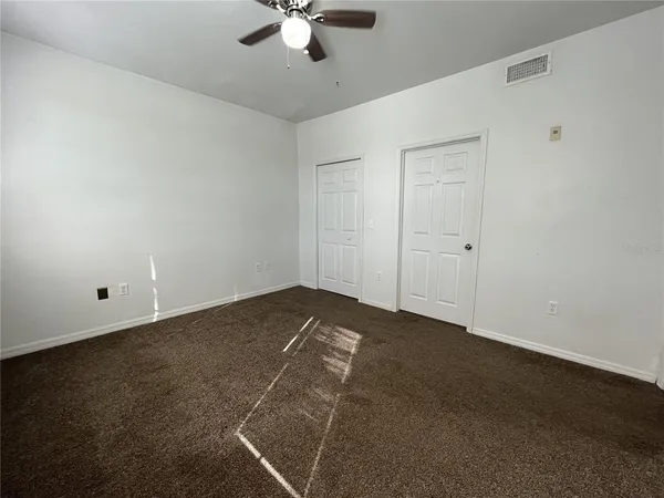 a view of a room with an empty space