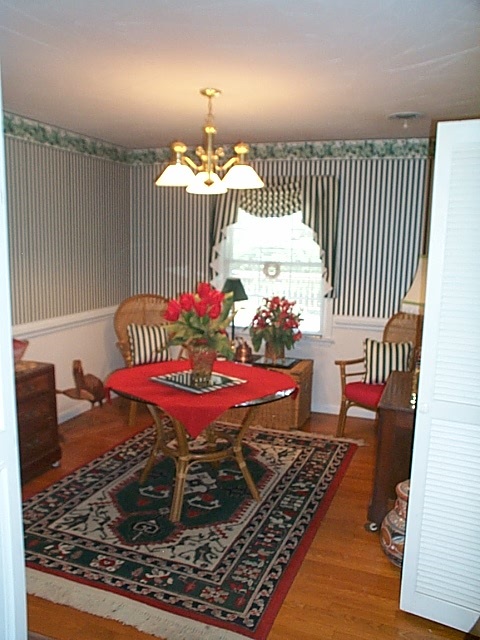 1541 Duke Road Waynesboro, VA 22980 - Photo 29 of 50 a view of a dining room with furniture a chandelier and wooden floor