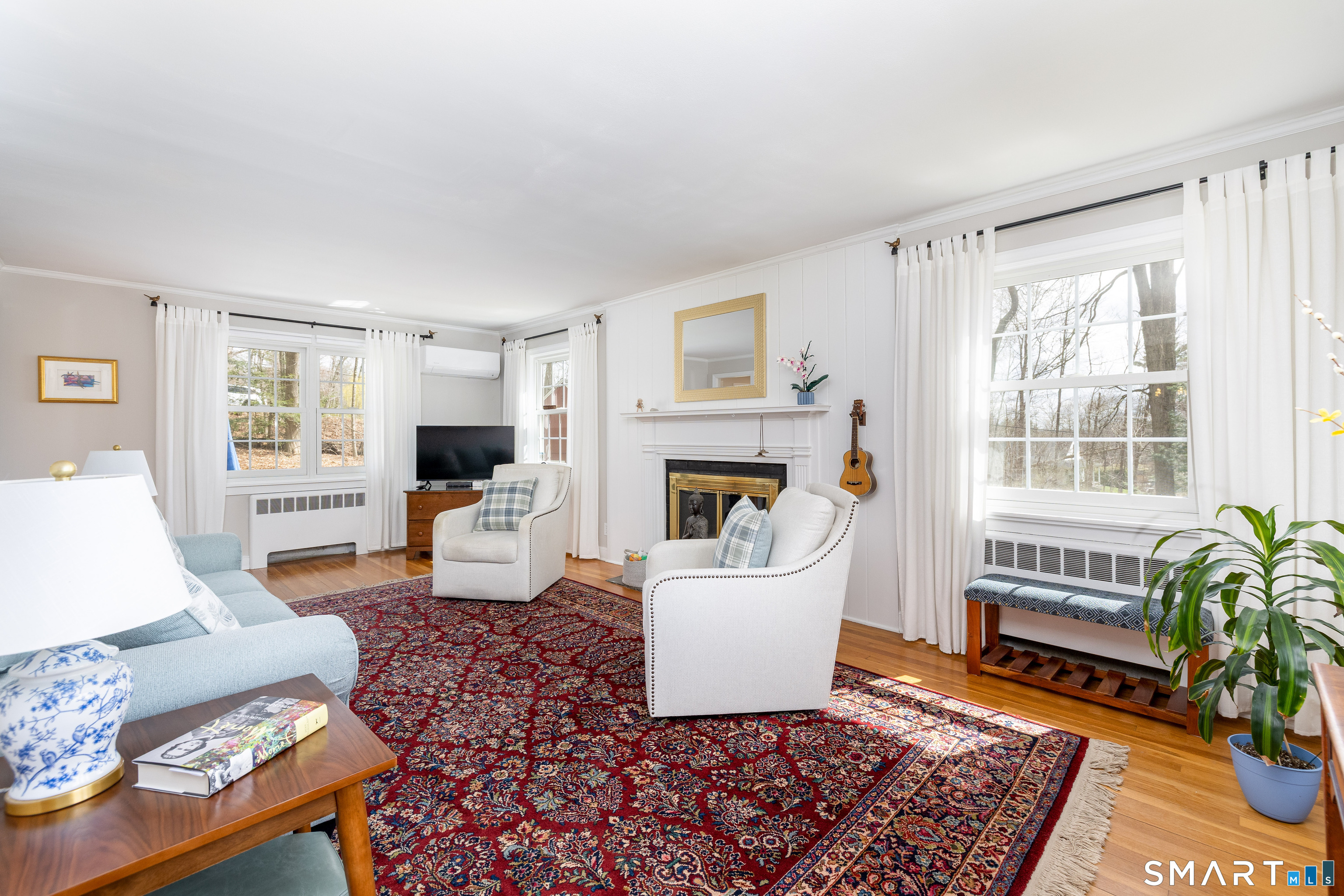 11 Sheldon Lane Litchfield, CT 06759 - Photo 8 of 33 a living room with furniture and a fireplace
