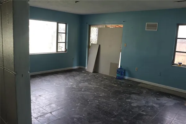 an empty room with windows