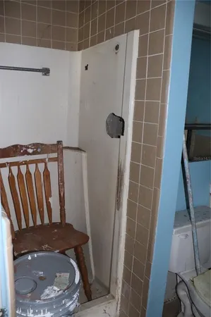 a bathroom with a sink and shower
