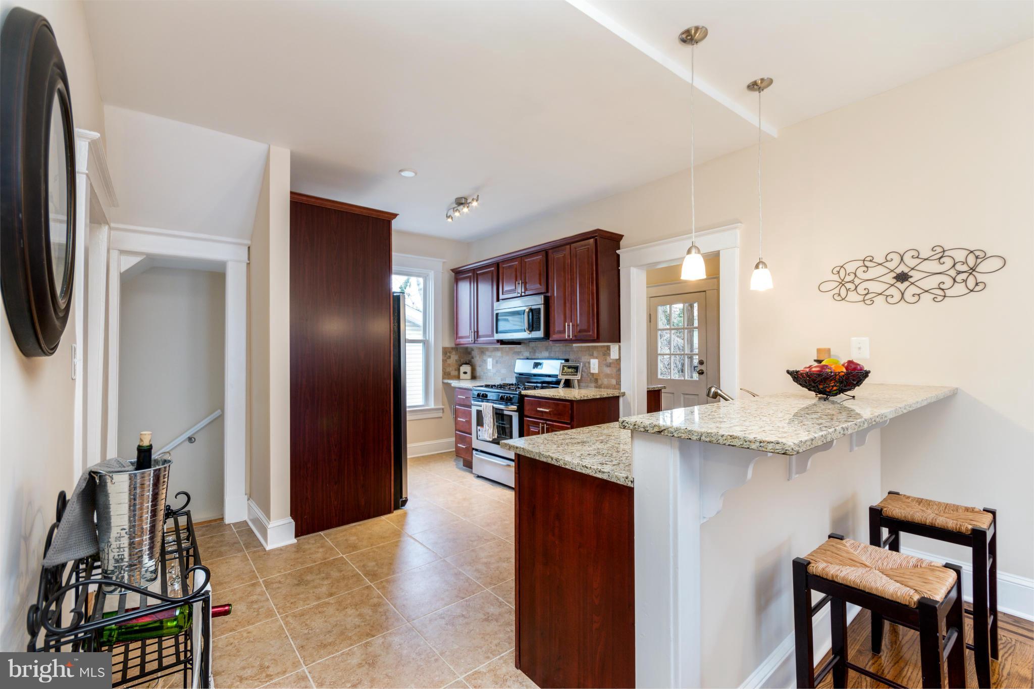 3114 Cedarhurst Road Baltimore, MD 21214 - Photo 12 of 30 Granite Breakfast Bar
