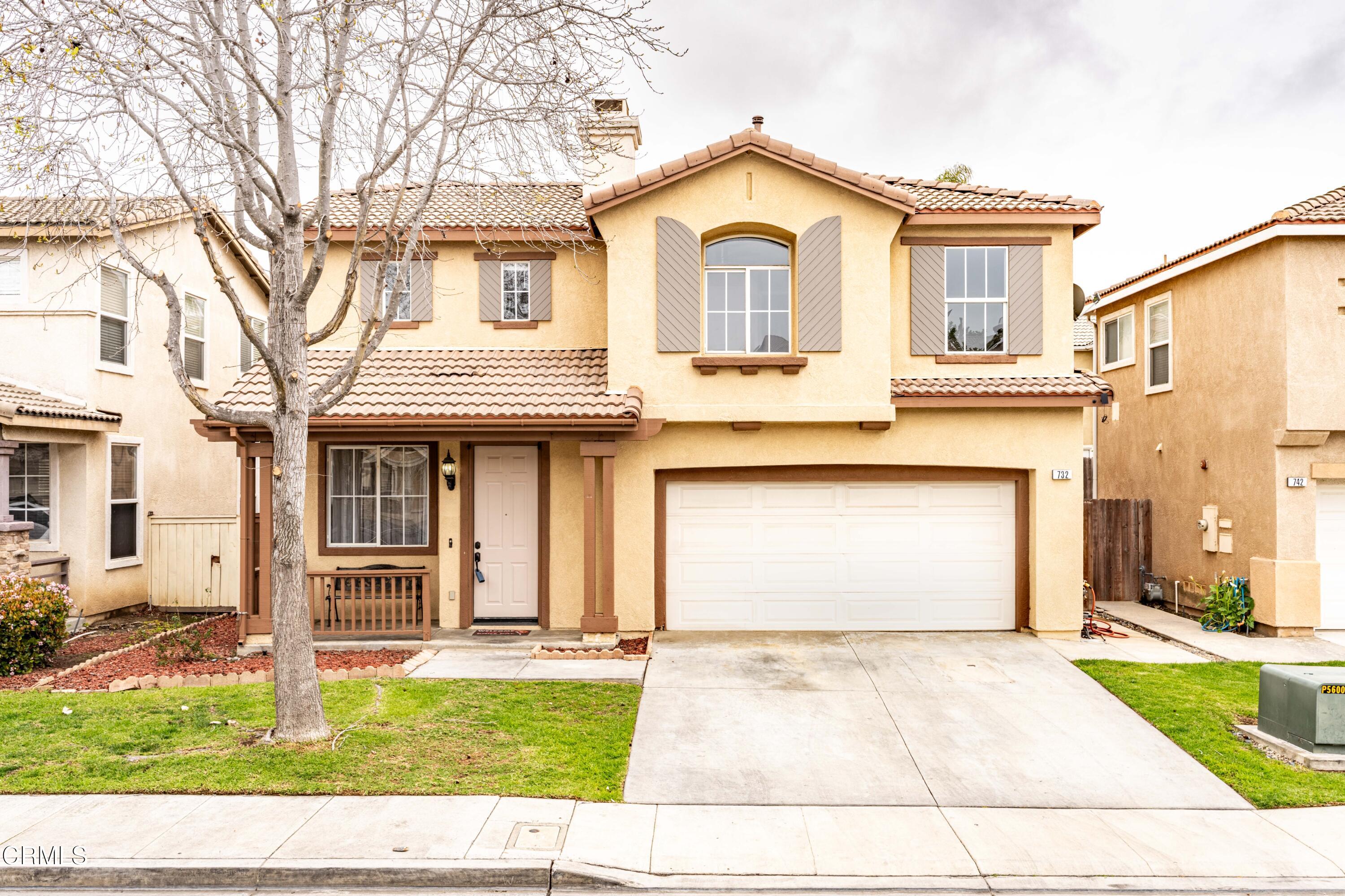 732 Pontoon Way Oxnard, CA 93035 - Photo 1 of 15 a view of a white house with a swimming pool and a yard