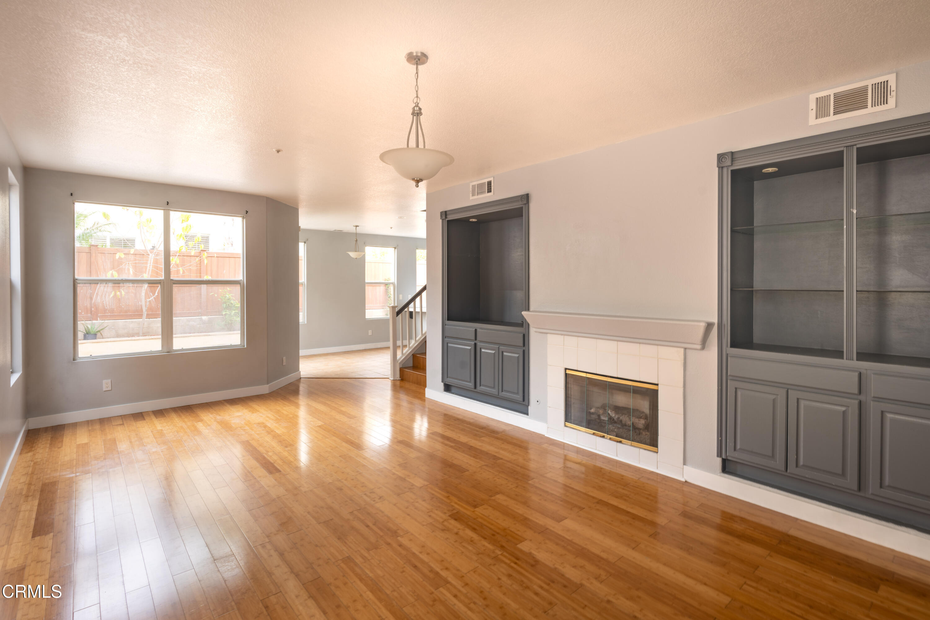 732 Pontoon Way Oxnard, CA 93035 - Photo 4 of 15 a view of a livingroom with a fireplace and wooden floor