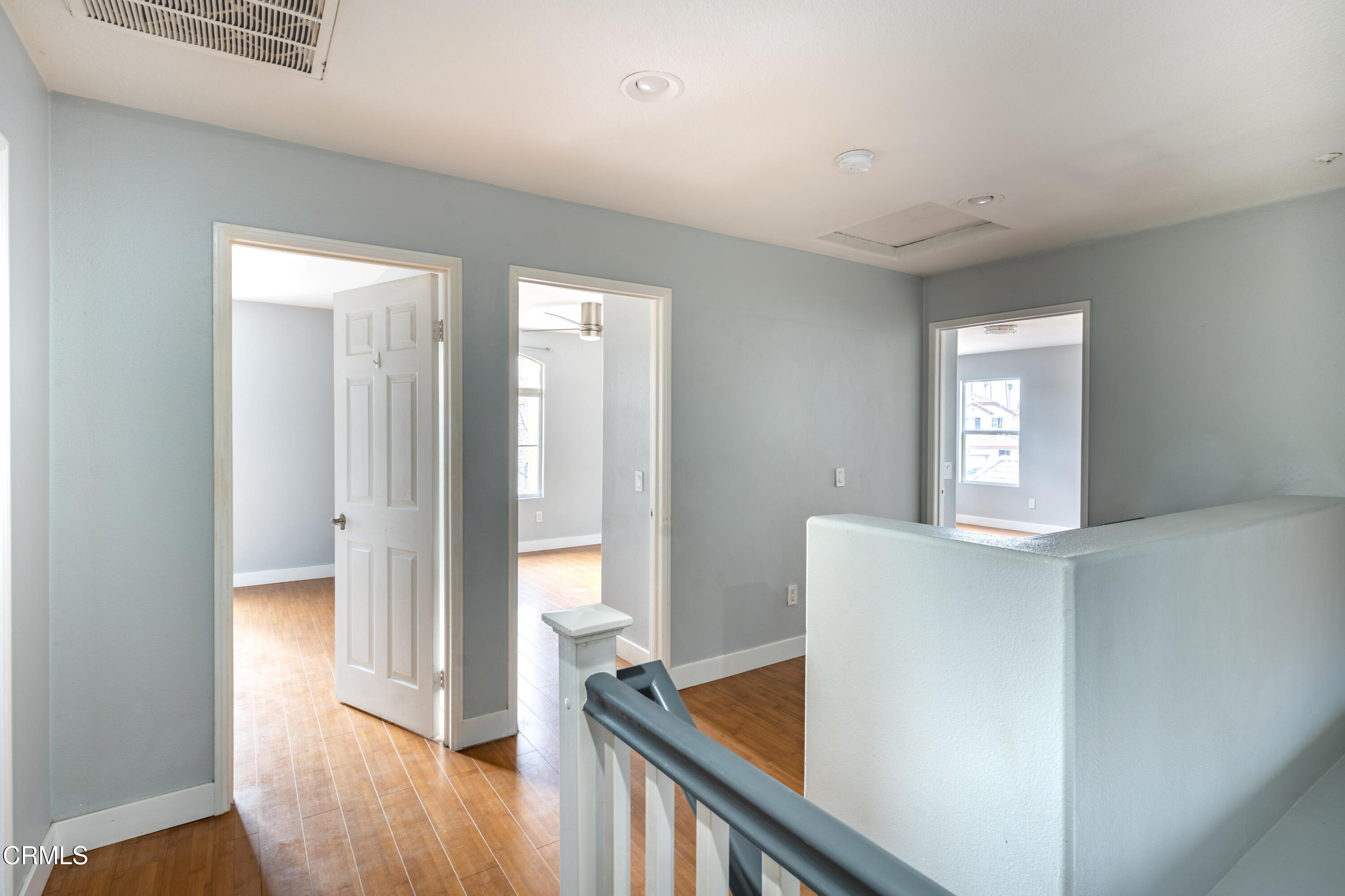 732 Pontoon Way Oxnard, CA 93035 - Photo 8 of 15 a view of a hallway with wooden floor and staircase