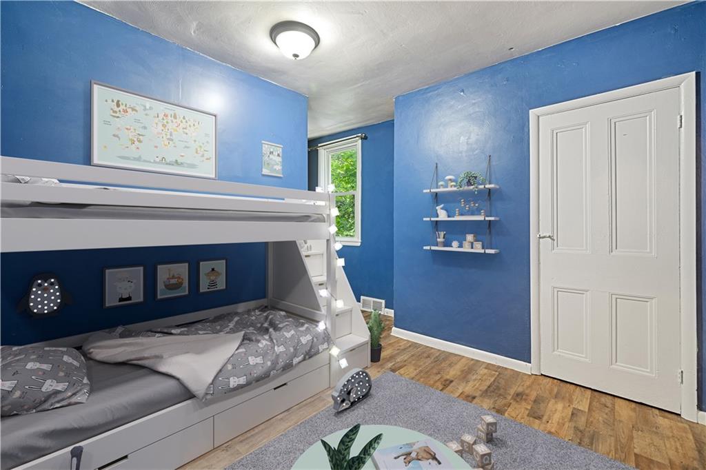 127 Fountain Street Pittsburgh, PA 15212 - Photo 13 of 25 a living room with furniture and a fireplace