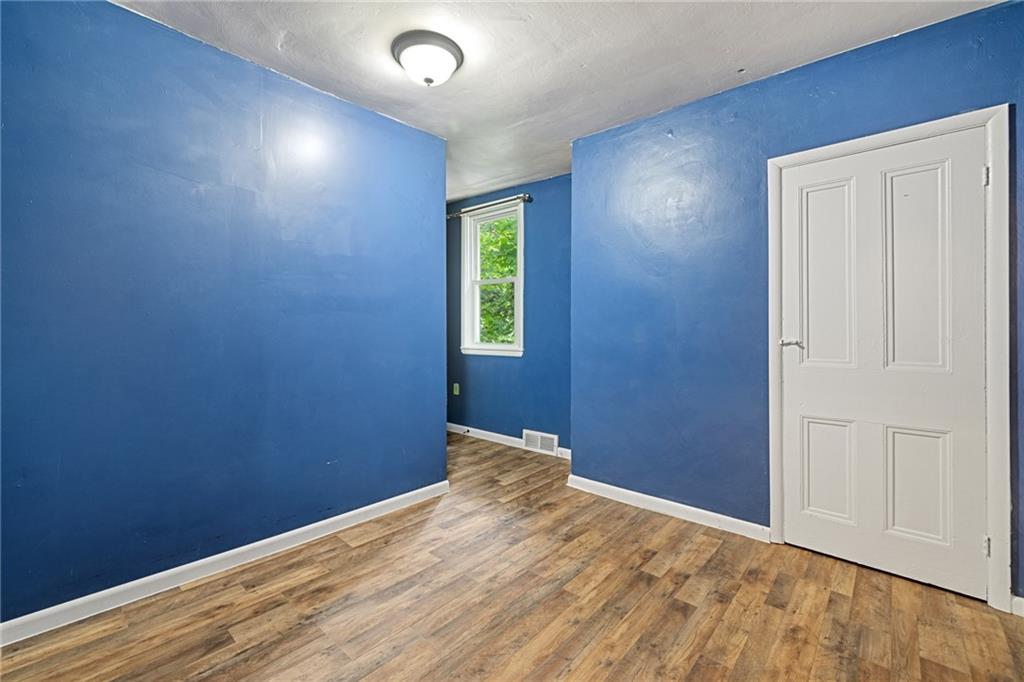 127 Fountain Street Pittsburgh, PA 15212 - Photo 14 of 25 an empty room with windows