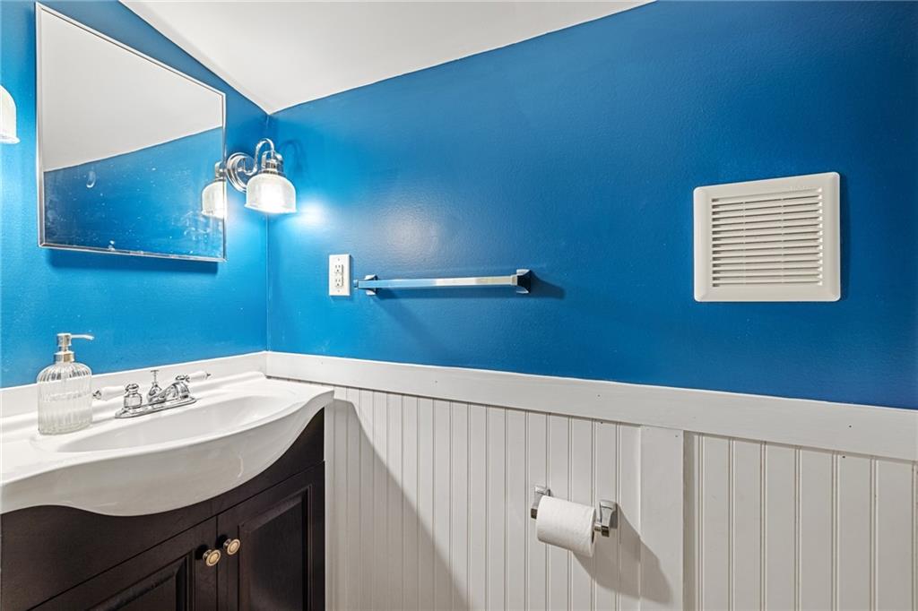 127 Fountain Street Pittsburgh, PA 15212 - Photo 8 of 25 a view of a hallway with furniture and chandelier