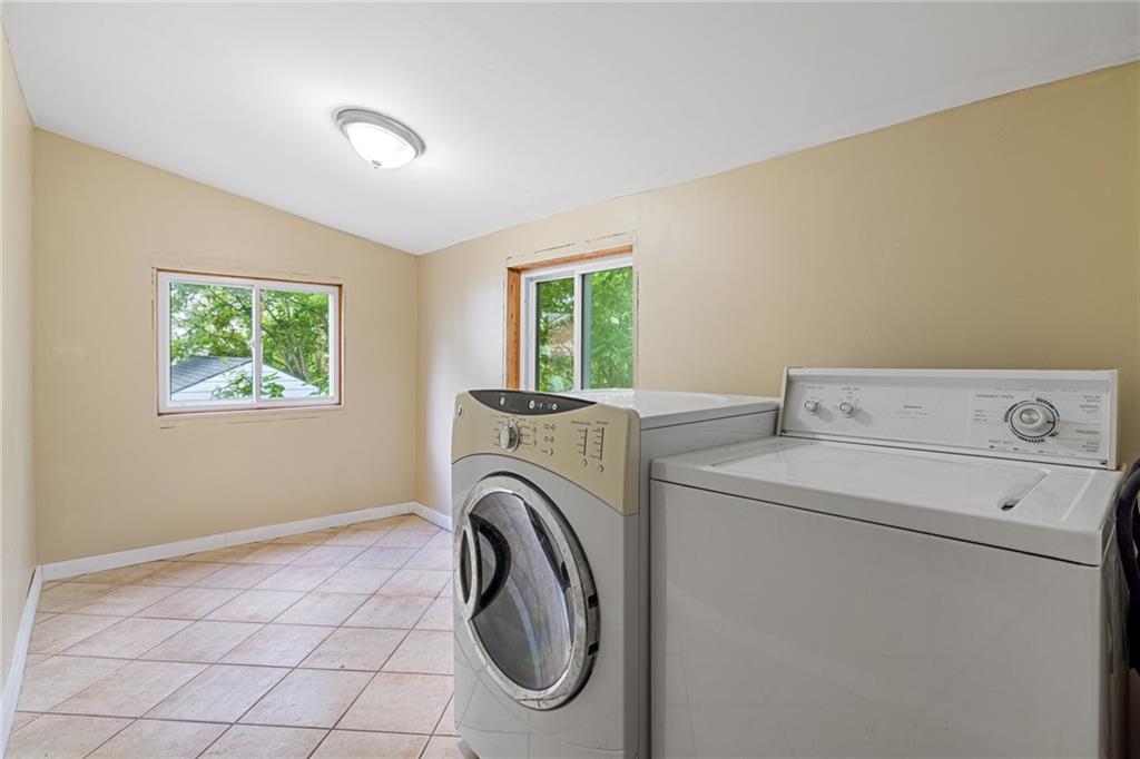 127 Fountain Street Pittsburgh, PA 15212 - Photo 9 of 25 a utility room with dryer and washer