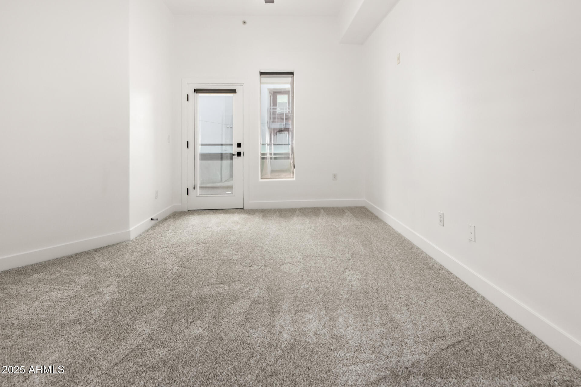 945 East Playa Del Norte Drive, Unit 4020 Tempe, AZ 85288 - Photo 15 of 39 an empty room with an empty space and windows