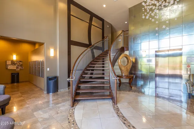 a view of entryway and hall with dining area