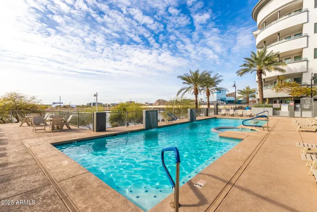 a view of a building with a swimming pool