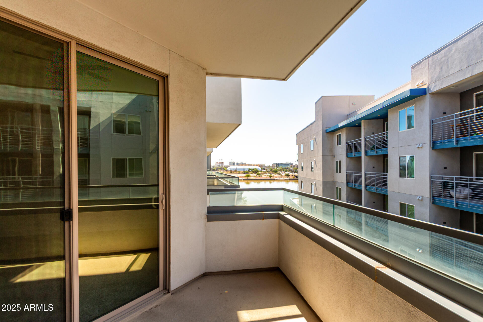 945 East Playa Del Norte Drive, Unit 4020 Tempe, AZ 85288 - Photo 4 of 39 a view of a building from a balcony