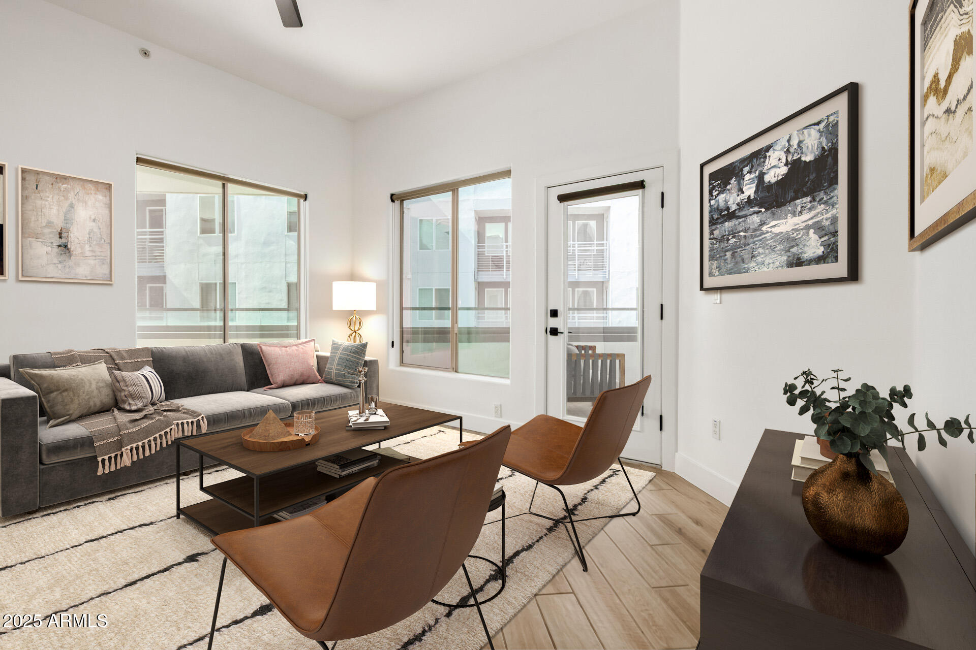 945 East Playa Del Norte Drive, Unit 4020 Tempe, AZ 85288 - Photo 7 of 39 a living room with furniture and wooden floor