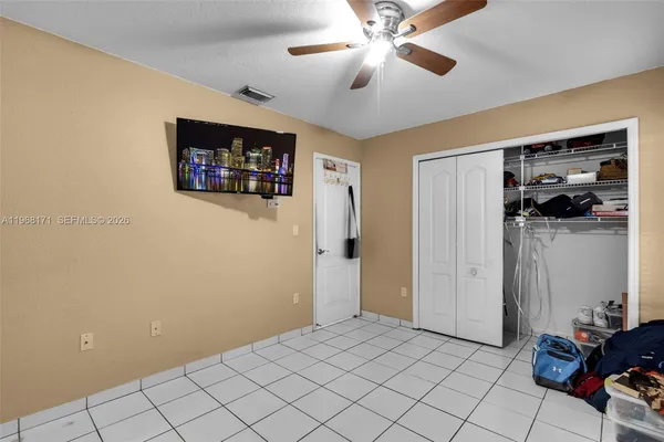 a view of a livingroom with a flat screen tv