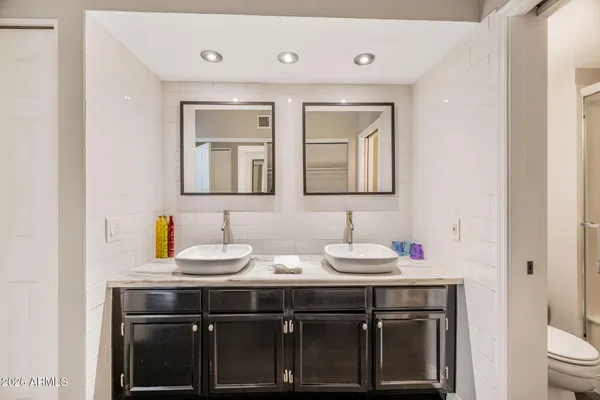 a bathroom with a sink and a toilet