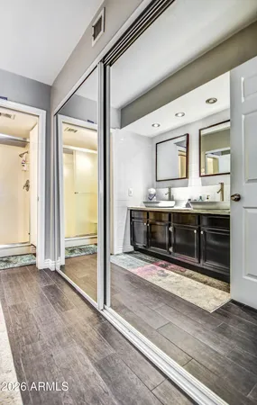 a view of kitchen with stainless steel appliances cabinets and outdoor space
