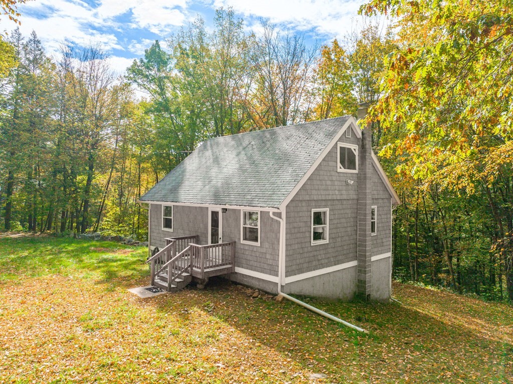 19 Broderick Road Monterey, MA 01245 - Photo 1 of 15 a view of a house with a yard