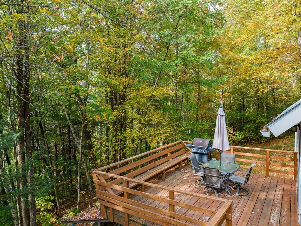 19 Broderick Road Monterey, MA 01245 - Photo 8 of 15 a view of a patio with chairs and potted plants