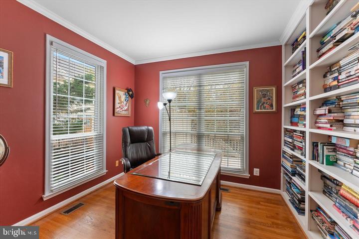 20900 Trinity Square Sterling, VA 20165 - Photo 15 of 38 a room with bookshelf and a window