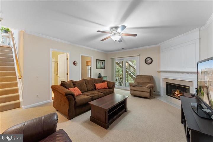 20900 Trinity Square Sterling, VA 20165 - Photo 32 of 38 a living room with furniture and a fireplace
