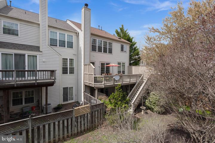 20900 Trinity Square Sterling, VA 20165 - Photo 33 of 38 a view of house with a chairs in patio