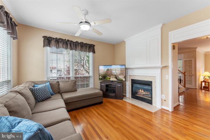 20900 Trinity Square Sterling, VA 20165 - Photo 6 of 38 a living room with furniture and a fireplace