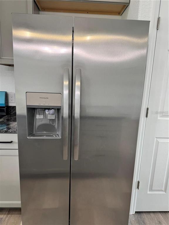 5394 Northwest 6th Place Ocala, FL 34482 - Photo 13 of 42 a kitchen with a refrigerator and a stove