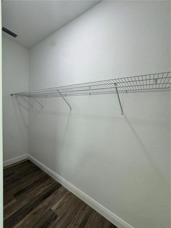 5394 Northwest 6th Place Ocala, FL 34482 - Photo 29 of 42 a view of a room with racks on the wall