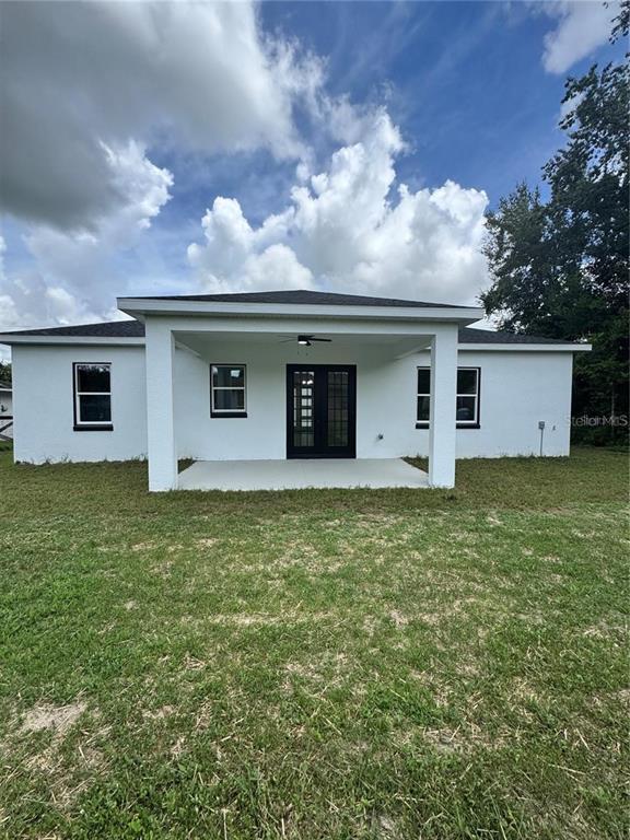 5394 Northwest 6th Place Ocala, FL 34482 - Photo 42 of 42 a view of a house with a backyard