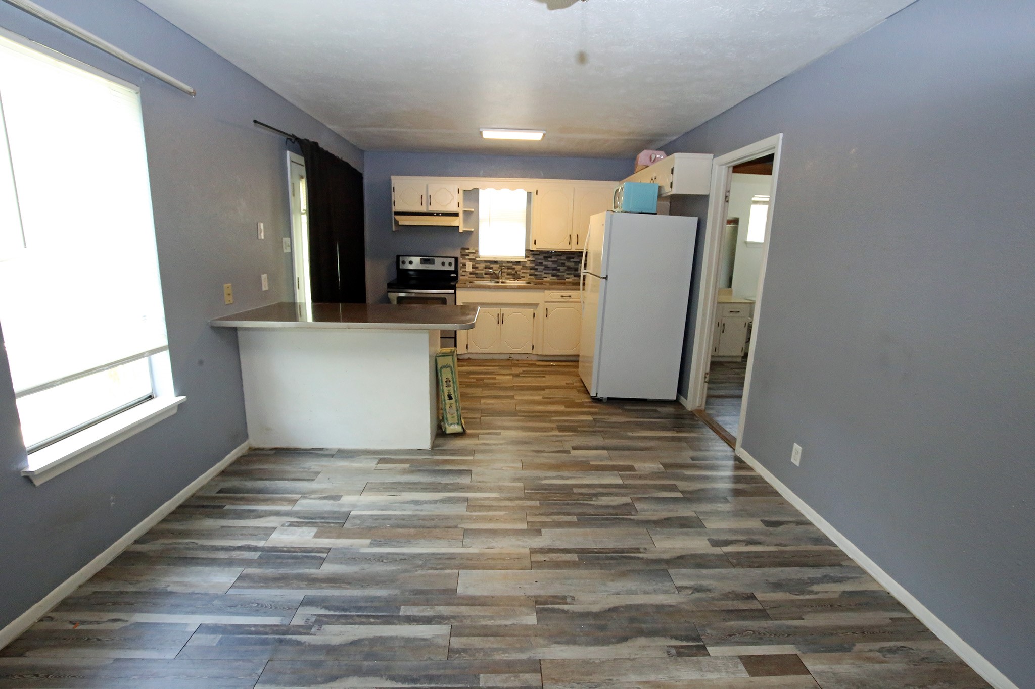 4406 FM 646 Road Santa Fe, TX 77510 - Photo 21 of 26 Kitchen/Living Room and Dining Room in the Garage Apartment!