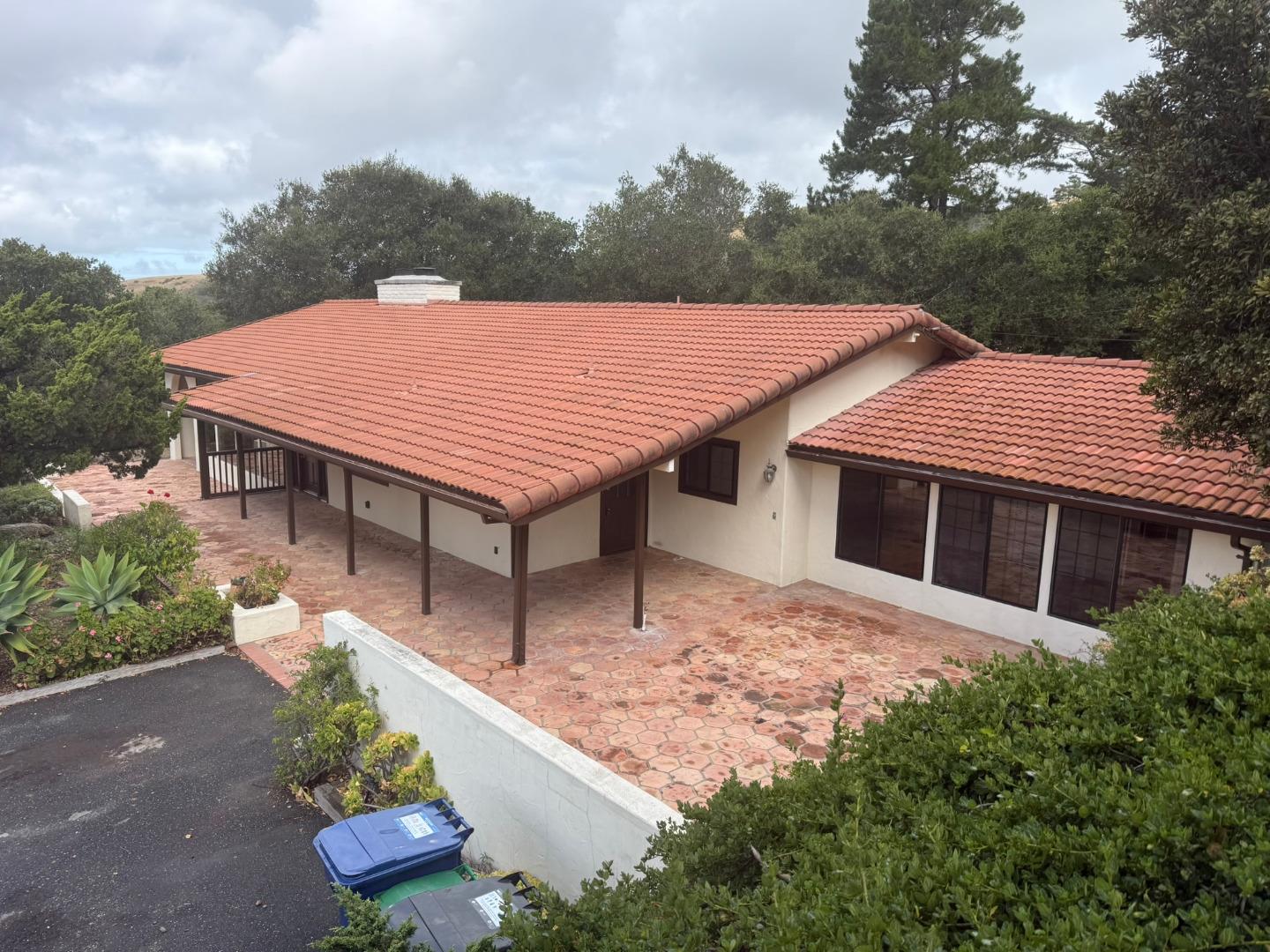 11585 McCarthy Road Carmel Valley, CA 93924 - Photo 2 of 52 a house with trees in front of it