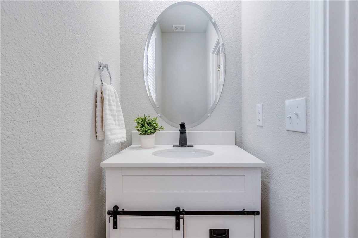 312 Triumph Road Buda, TX 78610 - Photo 19 of 37 Updated downstairs half bathroom