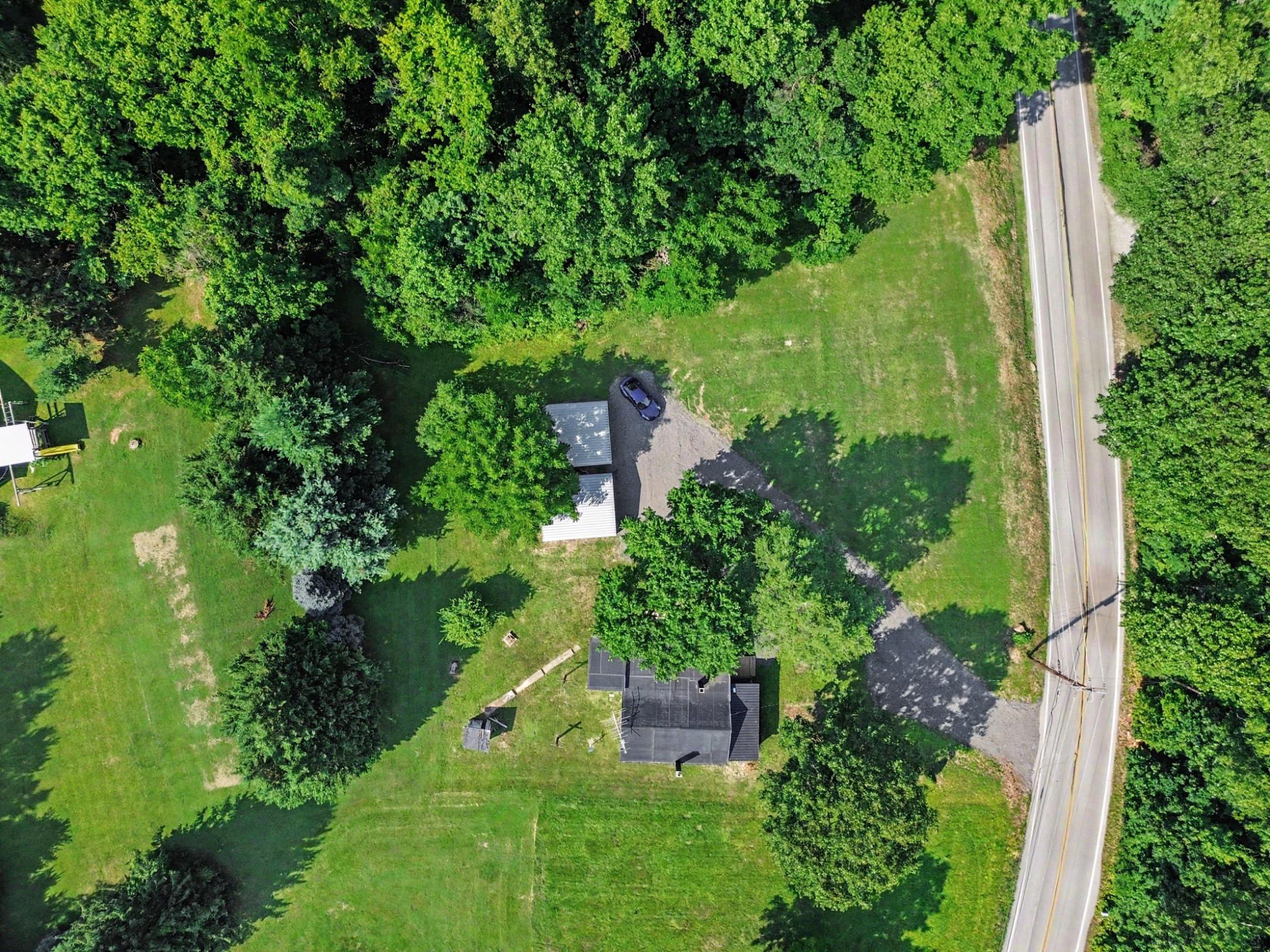 1041 Rohlers Church Road Dover, PA 17315 - Photo 29 of 33 Serene retreat amidst lush greenery.