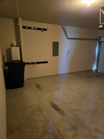 an empty room with wooden floor
