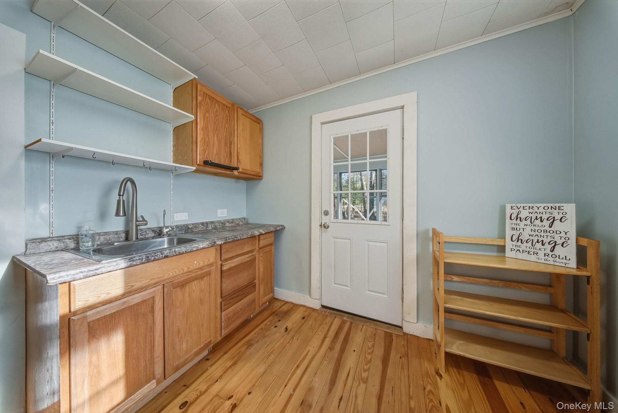 140 Highland Lake Road Highland Lake, NY 12743 - Photo 15 of 34 Kitchen featuring open shelves, light wood-style floors,