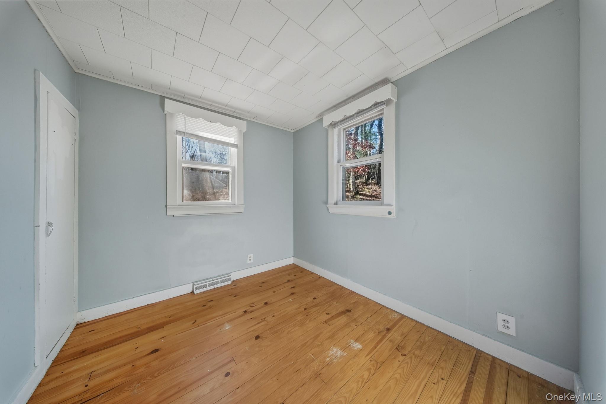 140 Highland Lake Road Highland Lake, NY 12743 - Photo 10 of 34 Unfurnished room featuring baseboards and light wood finished floors