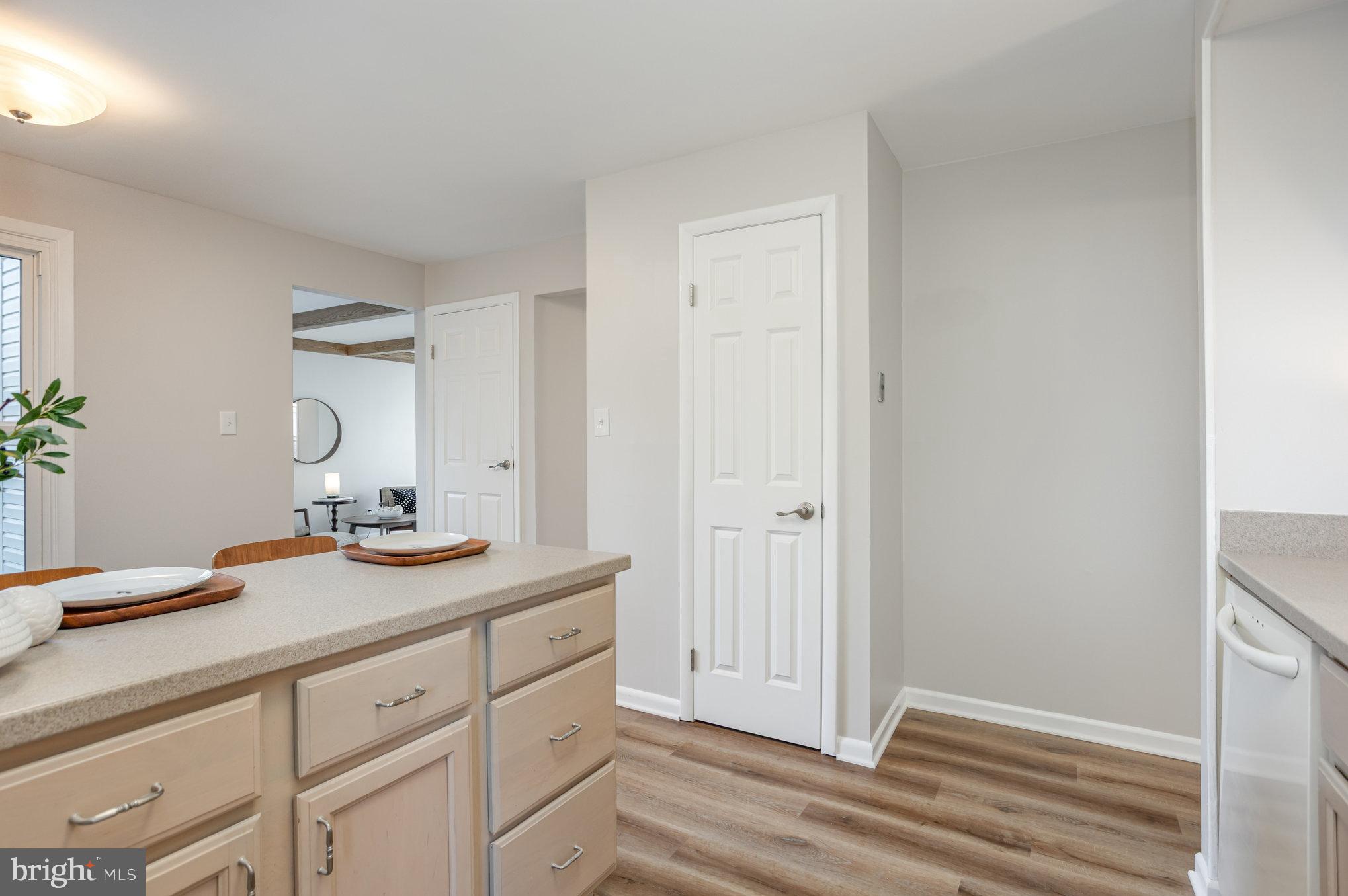 10509 Longbranch Road Cockeysville, MD 21030 - Photo 12 of 38 a bathroom with a granite countertop sink and a mirror