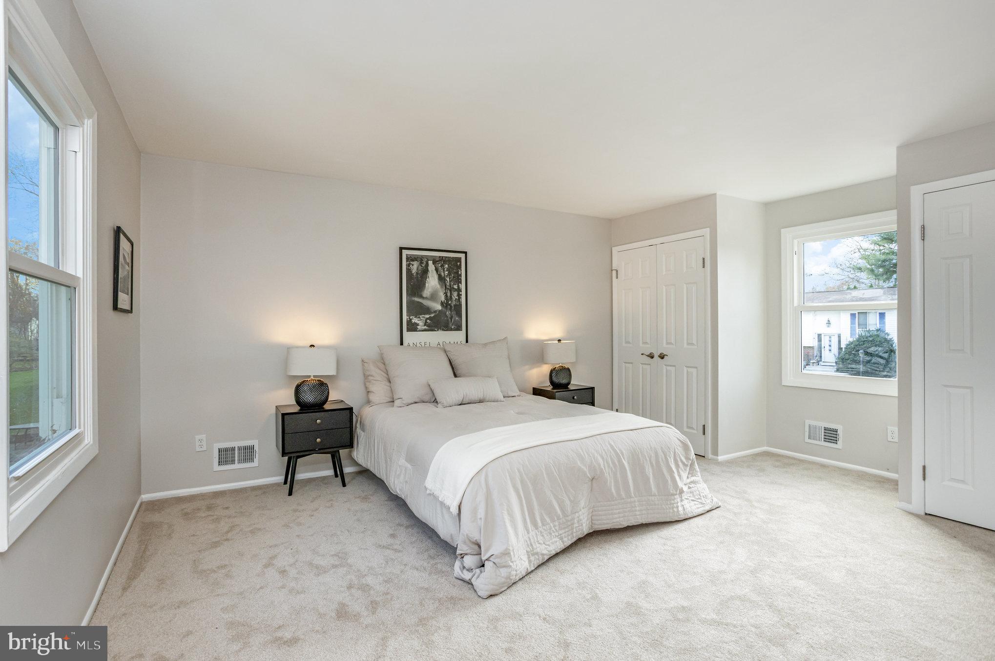 10509 Longbranch Road Cockeysville, MD 21030 - Photo 17 of 38 a bedroom with a bed and a window