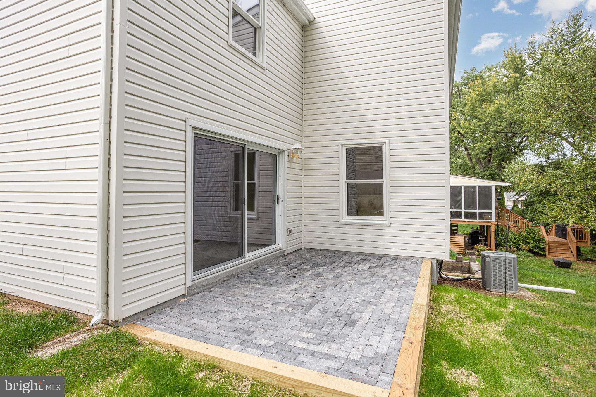 10509 Longbranch Road Cockeysville, MD 21030 - Photo 33 of 38 a view of a house with backyard and sitting area