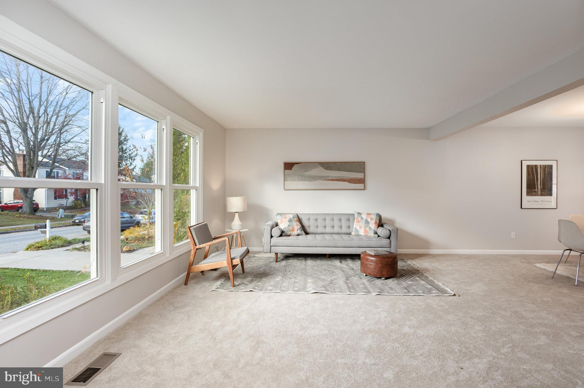 10509 Longbranch Road Cockeysville, MD 21030 - Photo 6 of 38 a living room with furniture and a large window