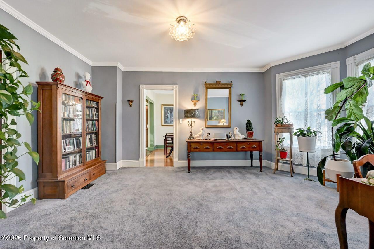 902 Columbia Street Scranton, PA 18509 - Photo 12 of 66 a bedroom with furniture and a potted plant
