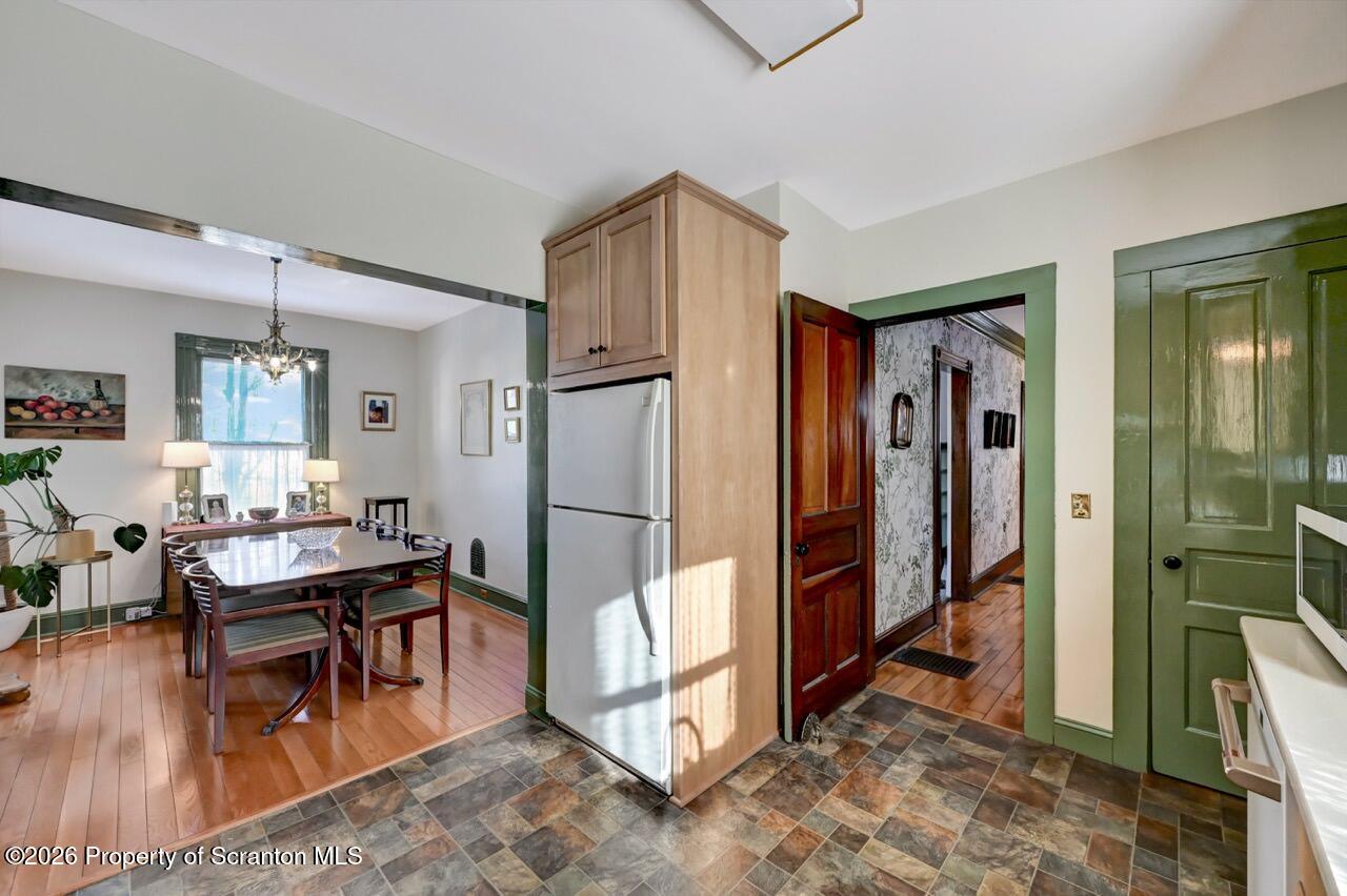 902 Columbia Street Scranton, PA 18509 - Photo 24 of 66 a kitchen with stainless steel appliances granite countertop a refrigerator and a stove top oven