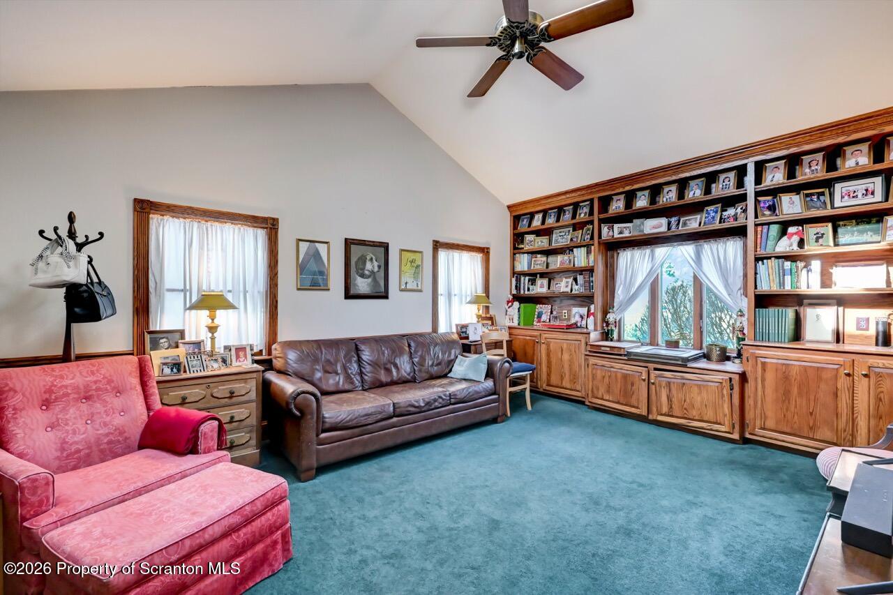 902 Columbia Street Scranton, PA 18509 - Photo 28 of 66 a living room with furniture and a window