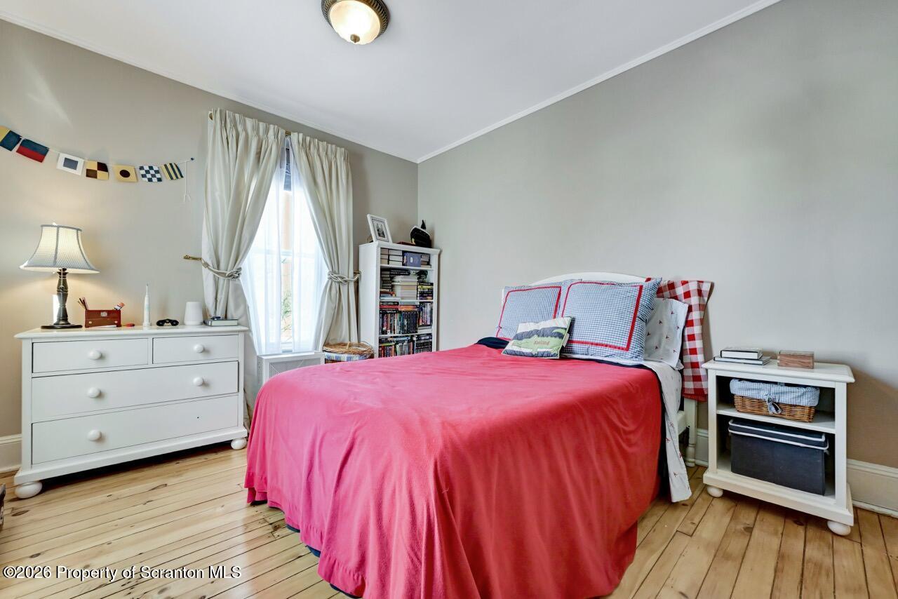 902 Columbia Street Scranton, PA 18509 - Photo 38 of 66 a bedroom with a bed and a window