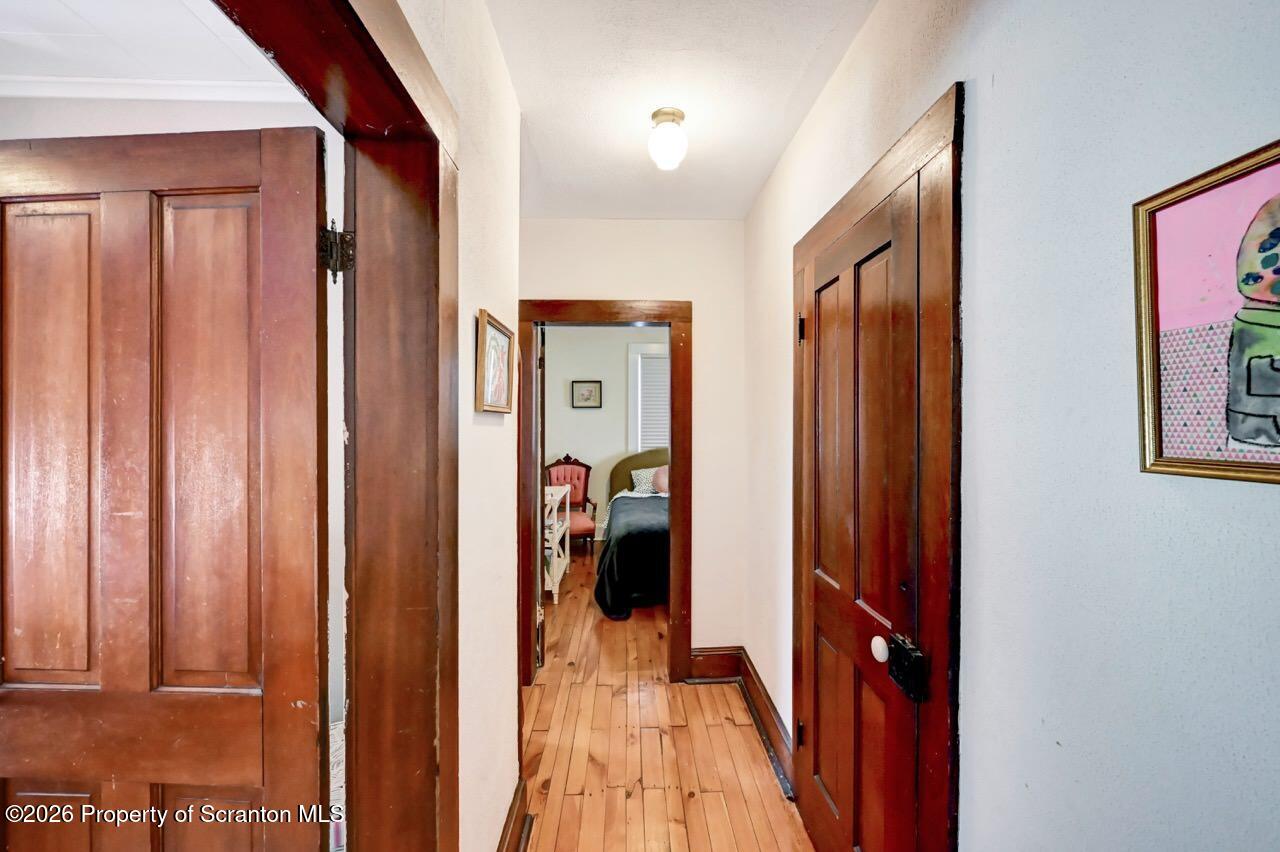 902 Columbia Street Scranton, PA 18509 - Photo 40 of 66 a view of a hallway with interior of the house