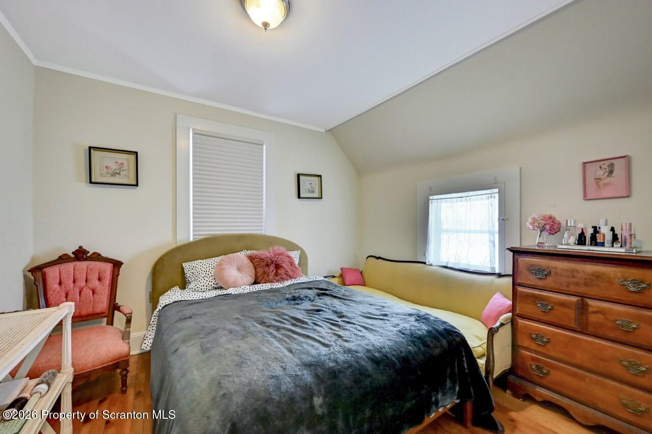 902 Columbia Street Scranton, PA 18509 - Photo 45 of 66 a bedroom with two beds and a dresser