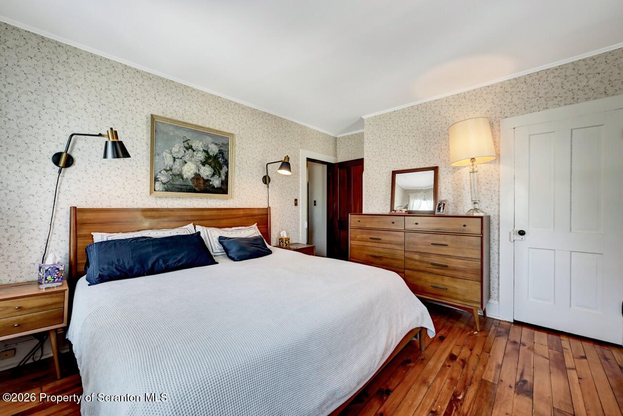 902 Columbia Street Scranton, PA 18509 - Photo 50 of 66 a bedroom with a bed and a flat screen tv