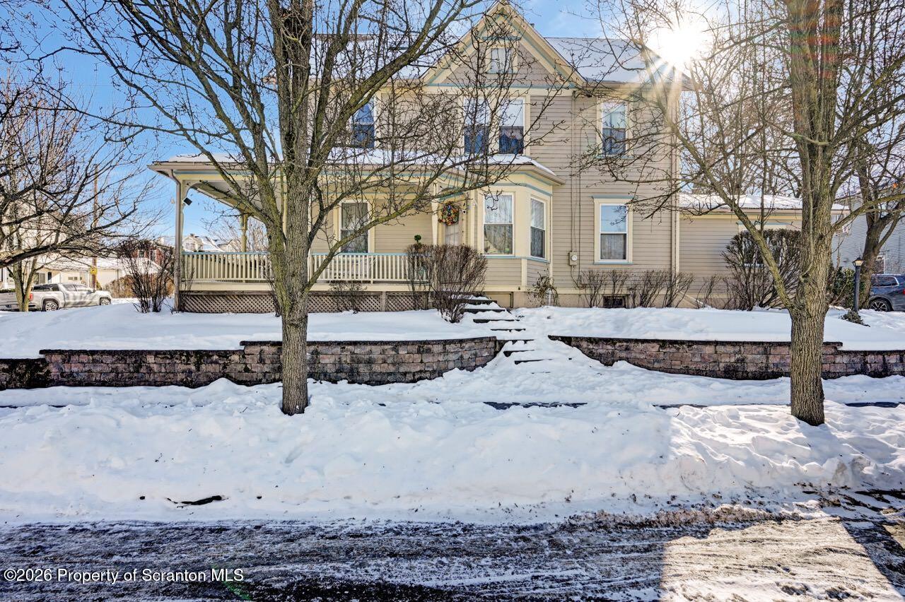 902 Columbia Street Scranton, PA 18509 - Photo 60 of 66 a view of white house with snow on the road