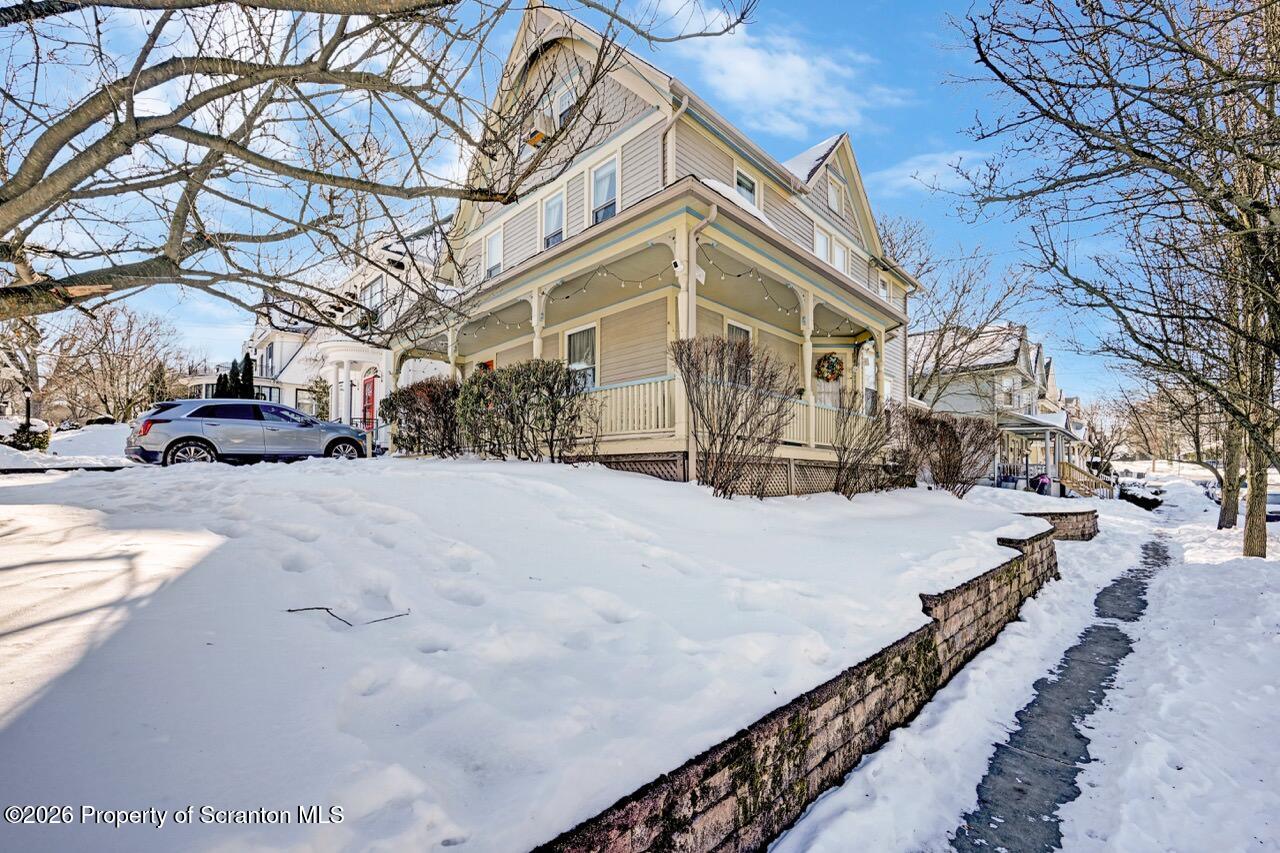 902 Columbia Street Scranton, PA 18509 - Photo 61 of 66 a view of a building with snow on the road
